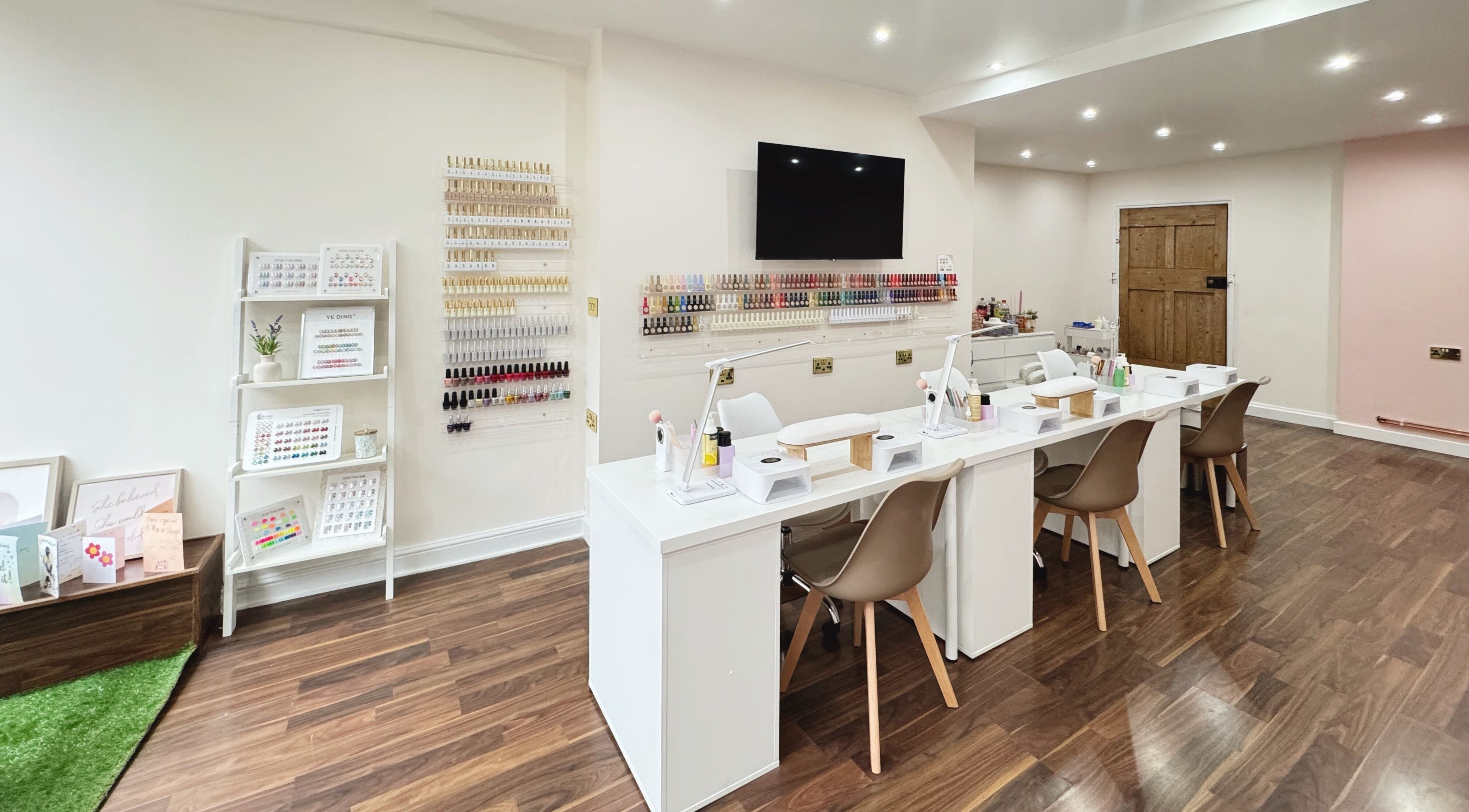 Sleek and modern nail service station at Dear Nail, Shrewsbury, England, GB showcasing a clean, bright interior.