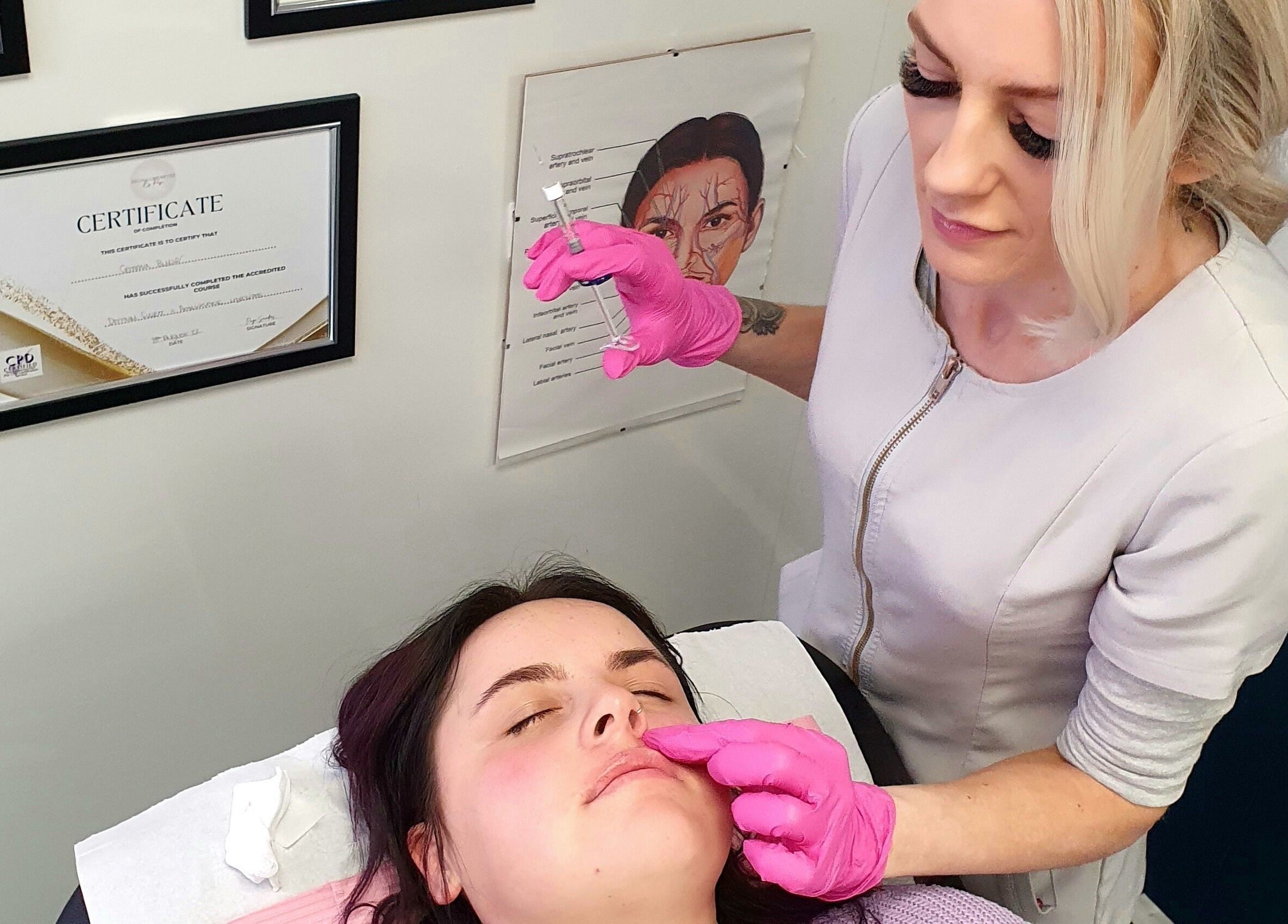 Expert aesthetician performs facial filler at GCI Advanced Aesthetics in Aberdeen, Scotland, GB.