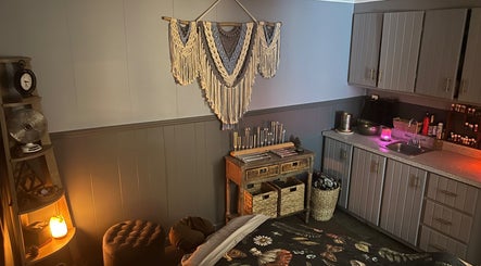 Calm therapy room at The Root Wellness Center, Caro, Michigan, US with a macramé wall hanging.