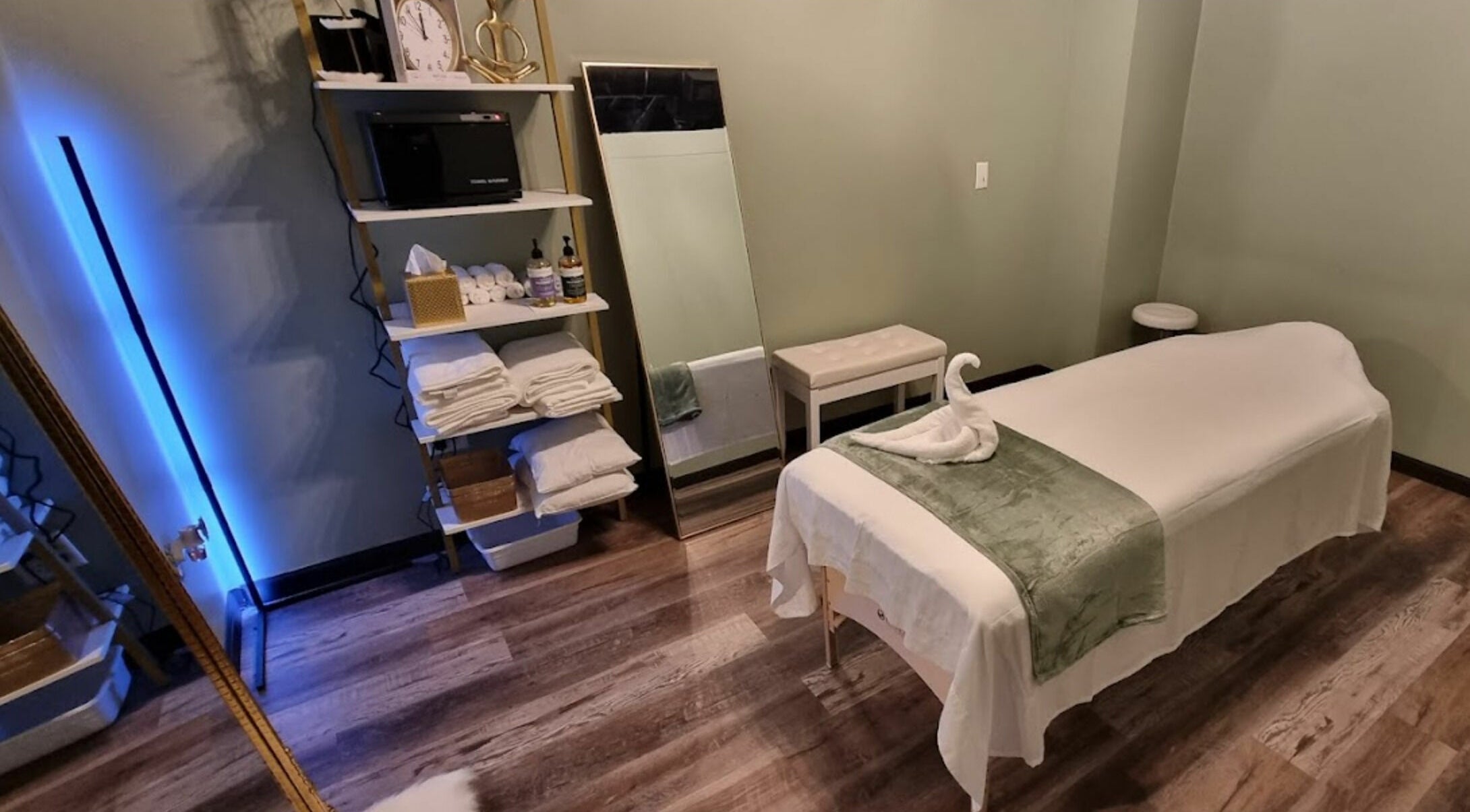 Serene spa room at Siam Massage and Wellness Spa, Bemidji, Minnesota, US showcasing a neatly arranged massage bed.