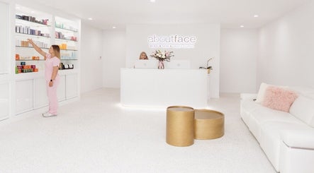 Modern reception at About Face, Taree, New South Wales, AU, showcasing stylish décor and product display.