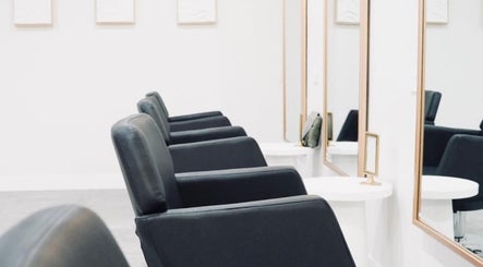 Chic salon chairs and mirrors at Salon Sloane, Happy Valley, South Australia, AU.