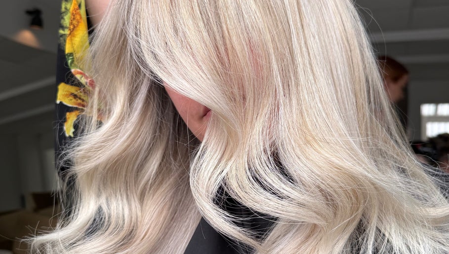 Styled blonde hair with golden waves at saradoeshair in Stoke-on-Trent, England, GB.