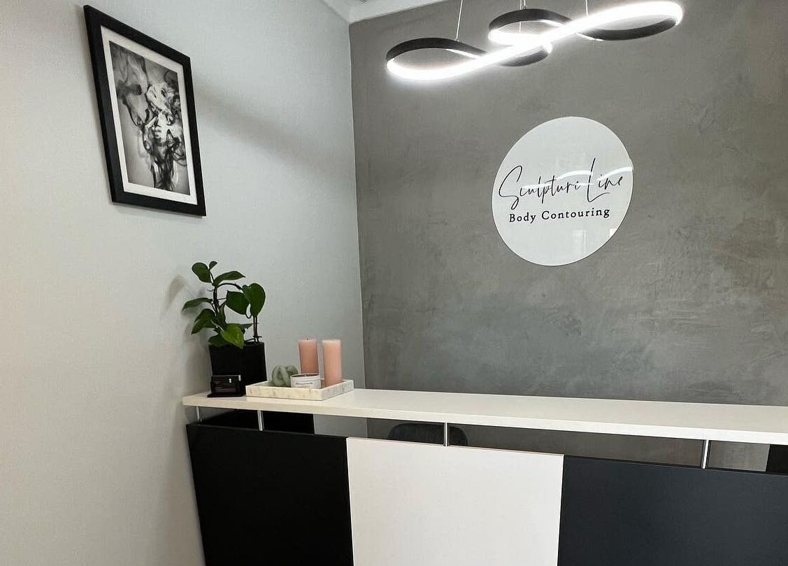 Reception desk at Sculpture Line Body Contouring, Kelmscott, Western Australia, AU with a modern décor.