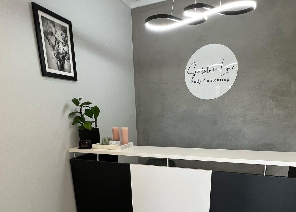 Reception desk at Sculpture Line Body Contouring, Kelmscott, Western Australia, AU with a modern décor.