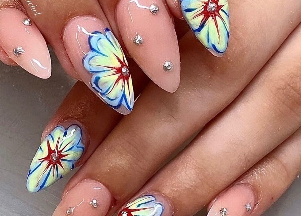 Elegant floral nail art at Gloxy Nails, Banbridge, Northern Ireland, GB, showcasing intricate designs.