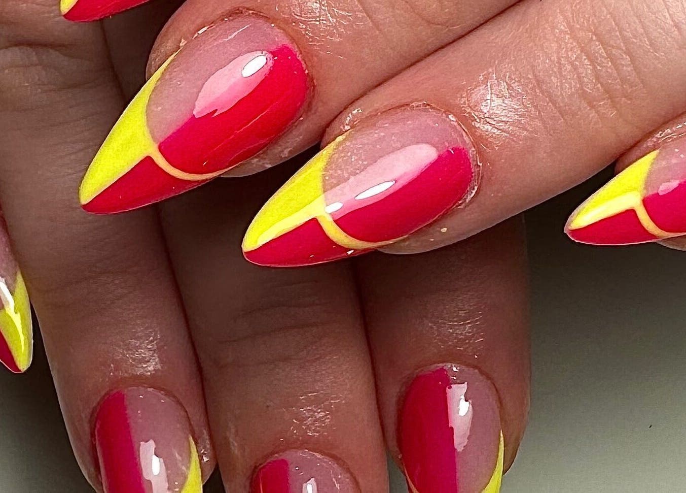 Elegant vibrant nail art in pink and yellow at Gloxy Nails, Banbridge, Northern Ireland, GB.