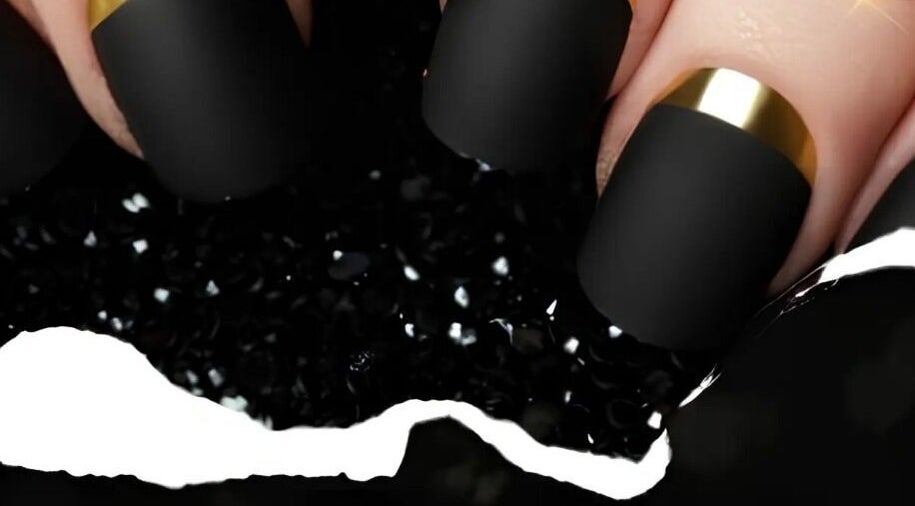 Elegant black and gold nail design at Stylistics Hair Studio, Cape Town, Western Cape, ZA.