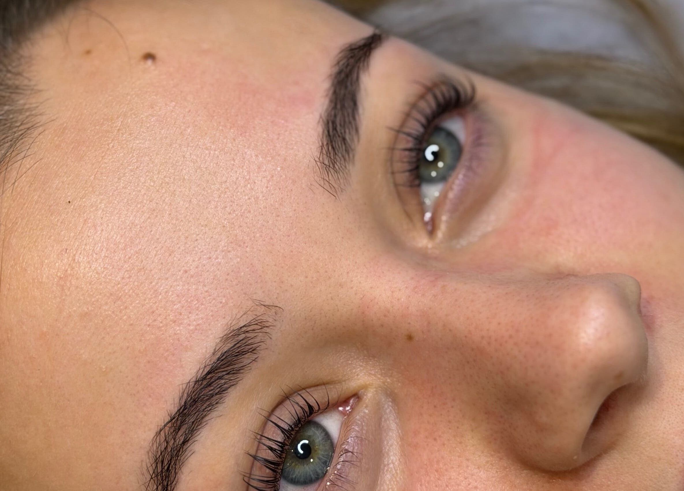 Close-up of a fresh-faced woman showcasing natural beauty at FLD Beauty, Stansted Mountfitchet, England, GB.