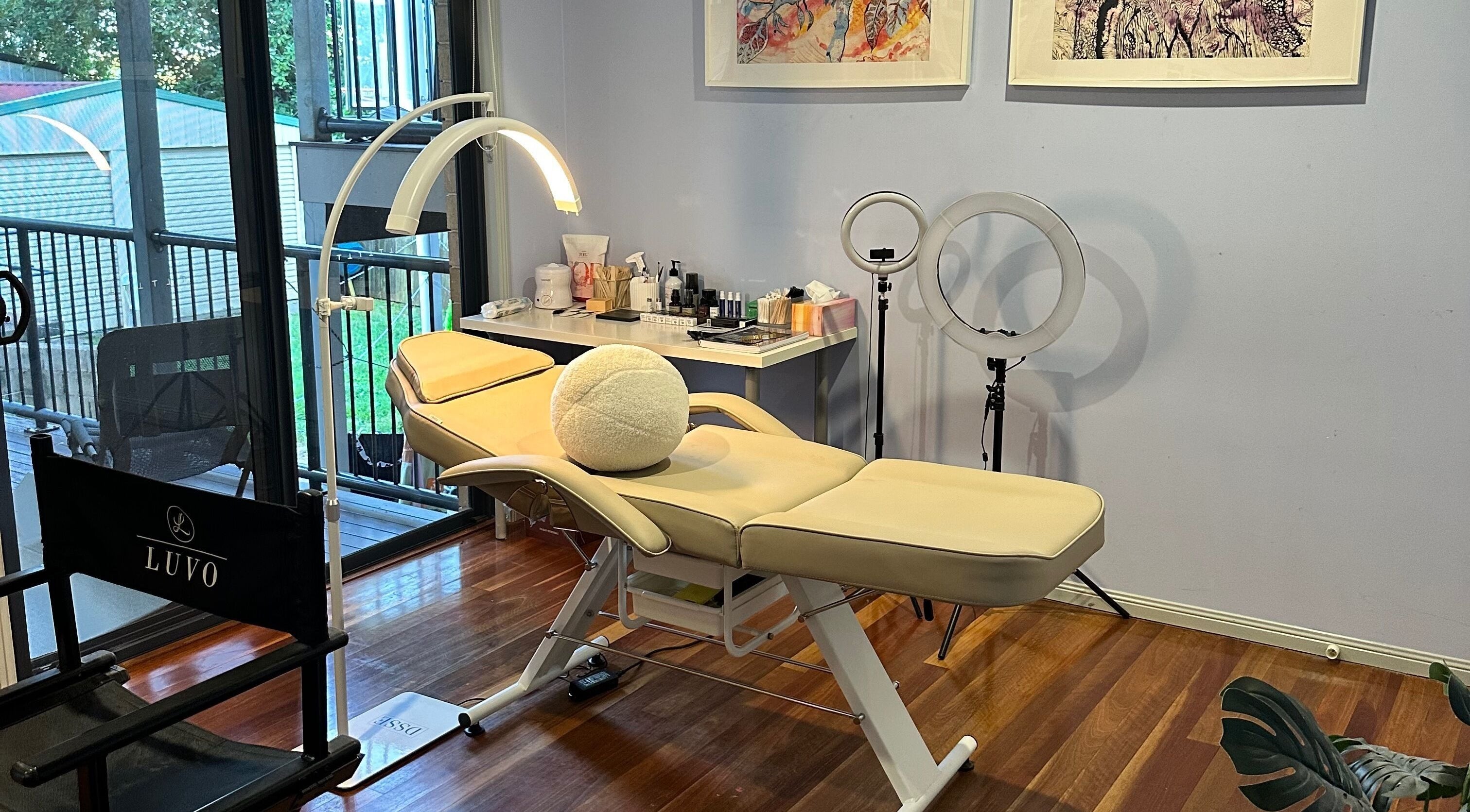 Relaxing spa room at Studio Marianna in Holland Park West, Queensland, AU with a comfortable treatment bed.