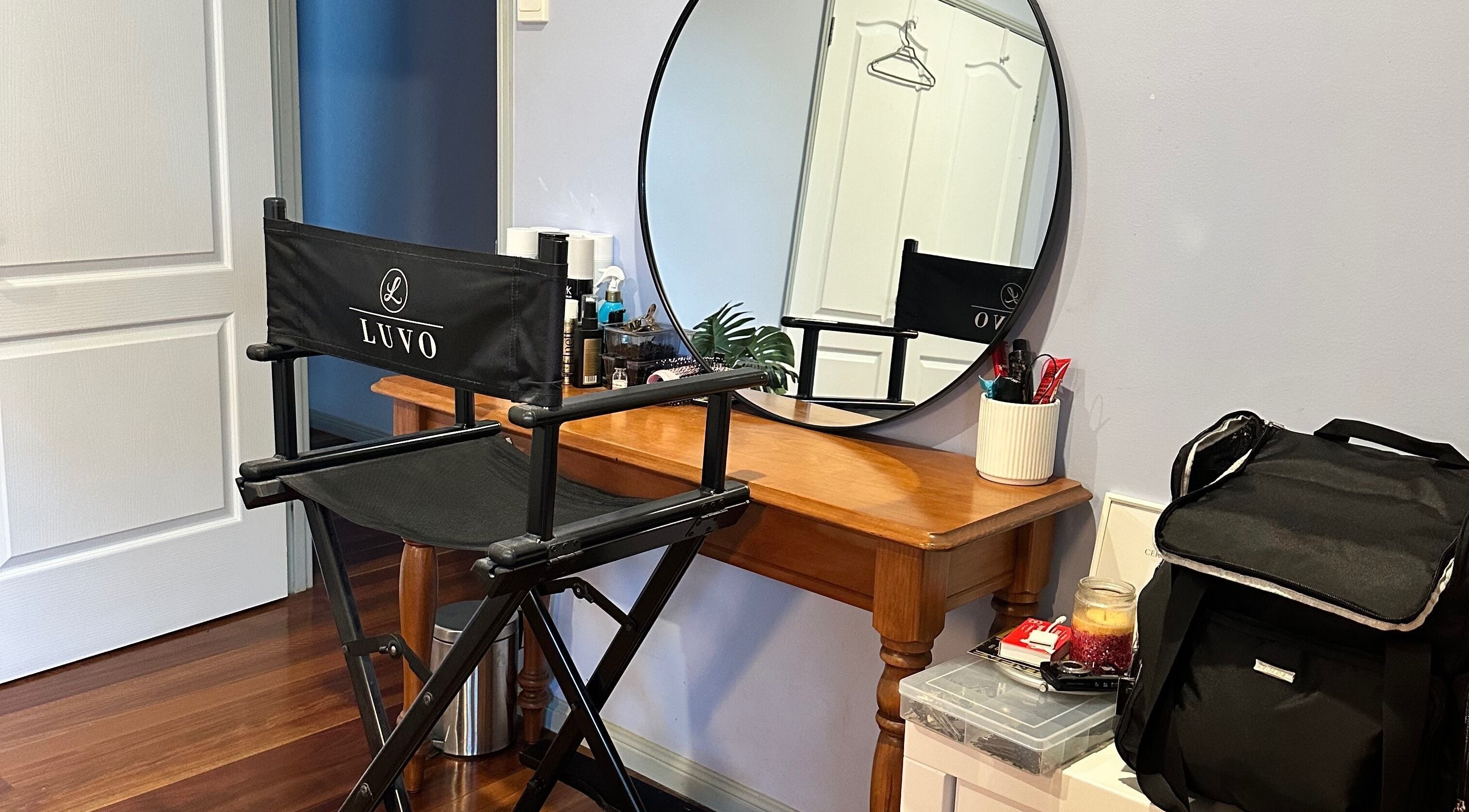 Studio Marianna's chic makeup station at Holland Park West, Queensland, AU, with chair and mirror setup.