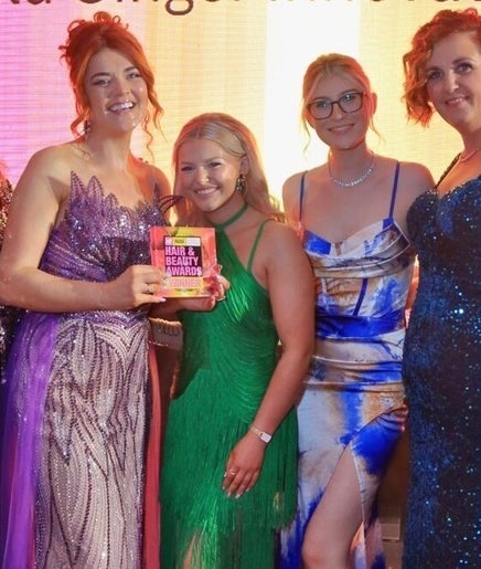 Team from Wild Ginger Innovative Hair in Nenagh, County Tipperary, IE celebrating a beauty award win.