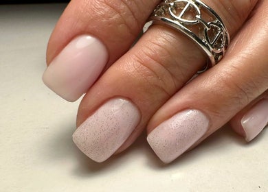 Elegant manicure with light pink polish at SORSIA, Bournemouth, England, GB.