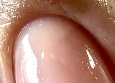 Close-up of a polished fingernail at SORSIA, Bournemouth, England, GB showcasing nail care expertise.