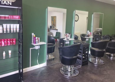 Elegant salon chairs and product display at SORCIA, Bournemouth, England, GB.