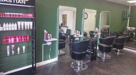 Elegant salon chairs and product display at SORCIA, Bournemouth, England, GB.