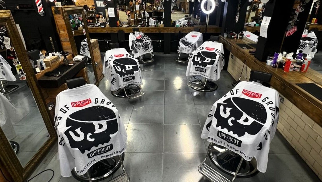Modern barber chairs at SB Barbering Academy Sunderland, Sunderland, England, GB, ready for expert grooming.