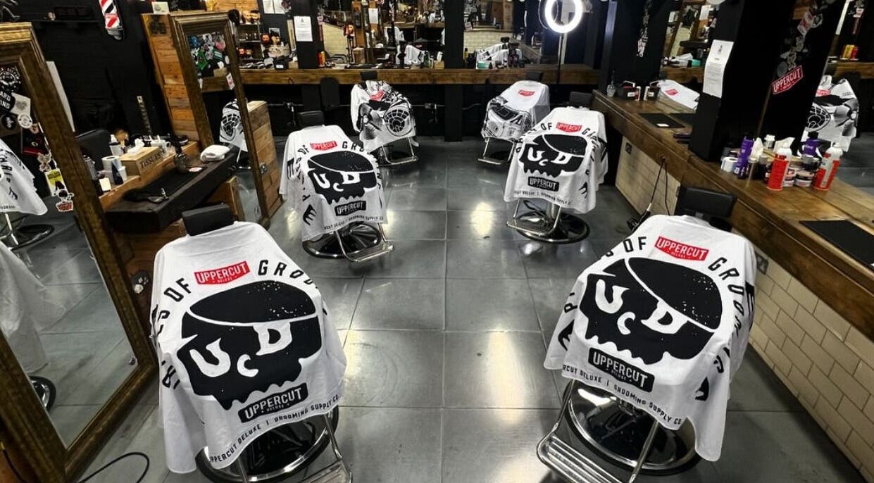 Modern barber chairs at SB Barbering Academy Sunderland, Sunderland, England, GB, ready for expert grooming.