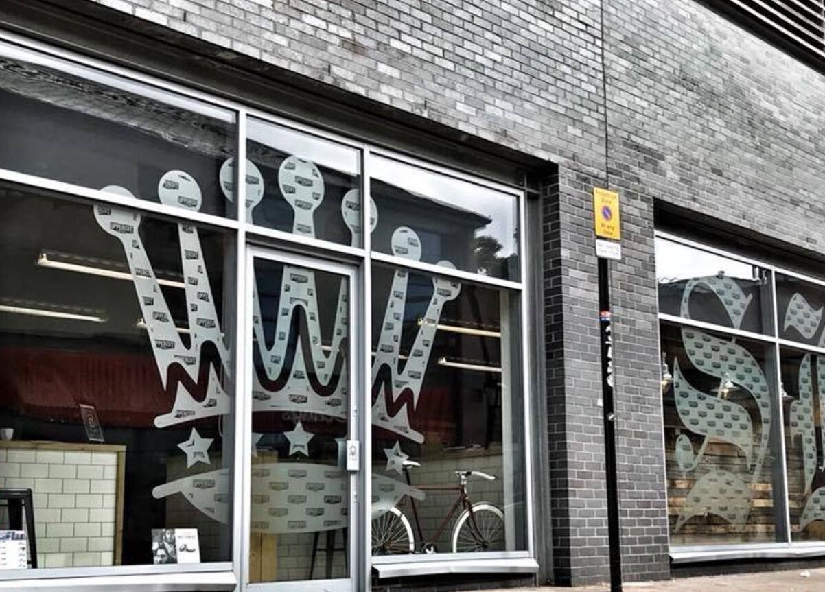 Exterior of SB Barbering Academy Sunderland at Sunderland, England, GB with unique window designs.