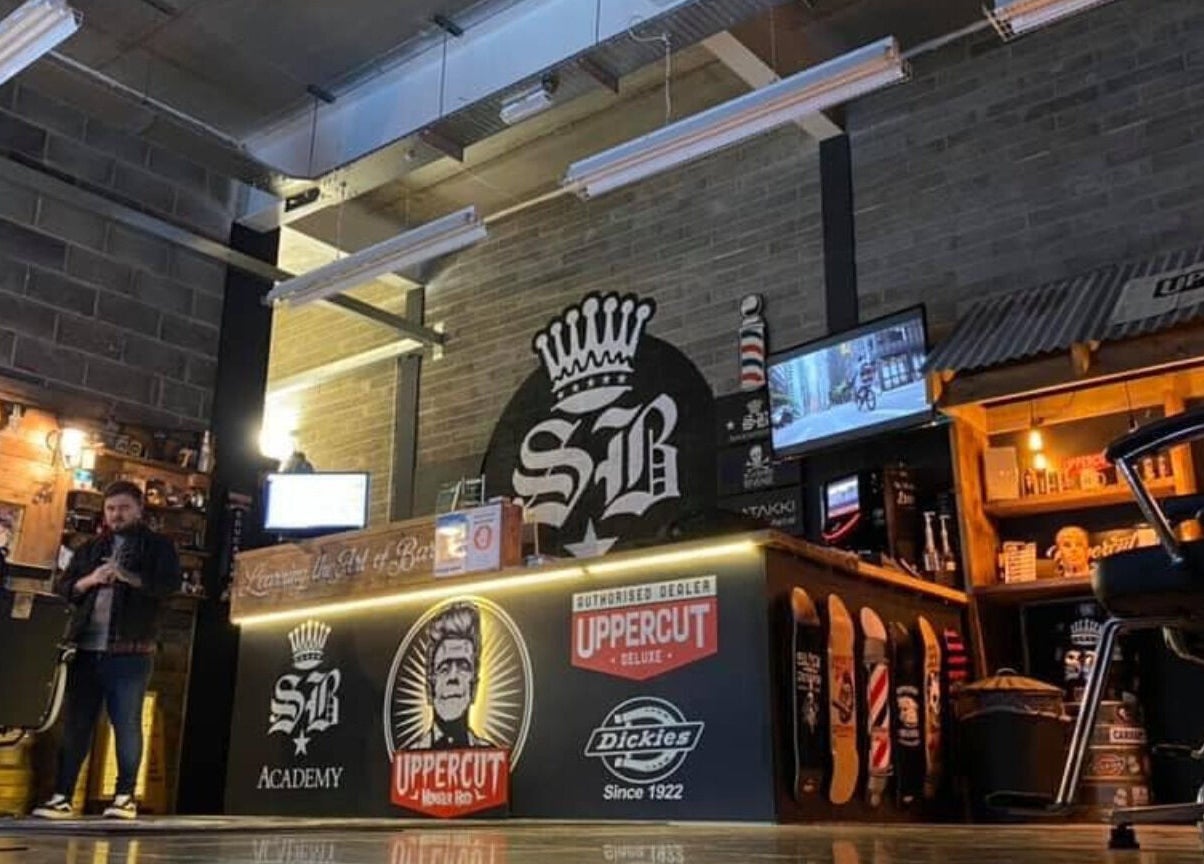 Interior of SB Barbering Academy Sunderland showcasing stylish barber chairs and decor in Sunderland, England, GB.