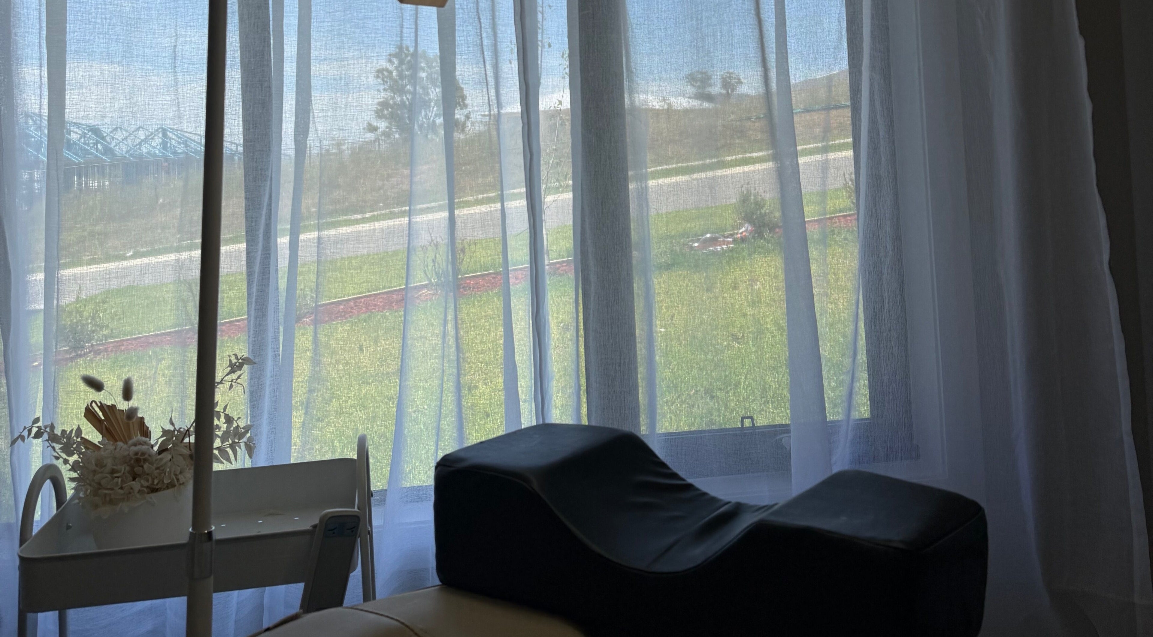 Peaceful treatment room at Amanda’s Beauty Room, Muswellbrook, New South Wales, AU with serene window view.