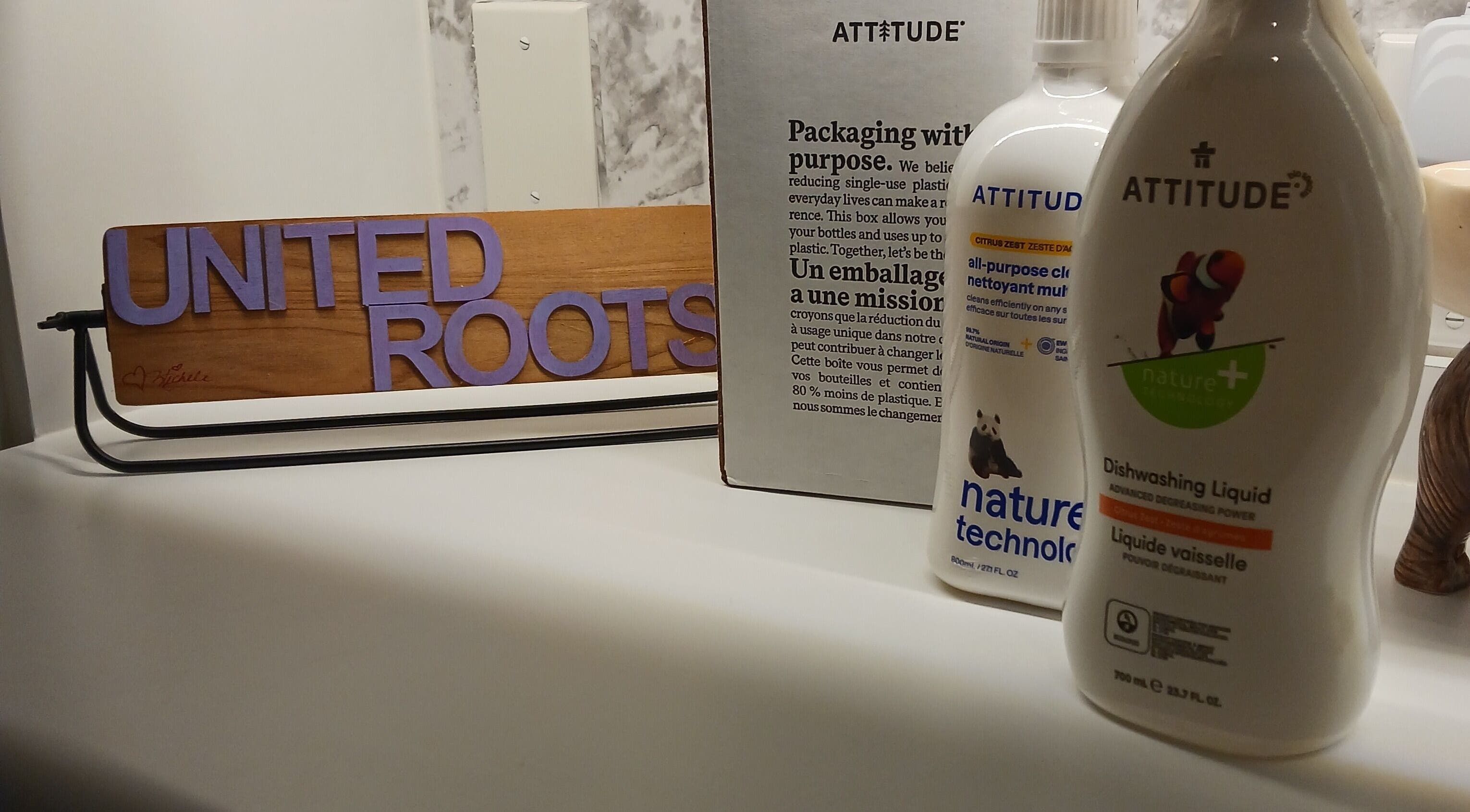 Products on a counter at United Roots Massage, North Massapequa, New York, US showcasing natural care items.