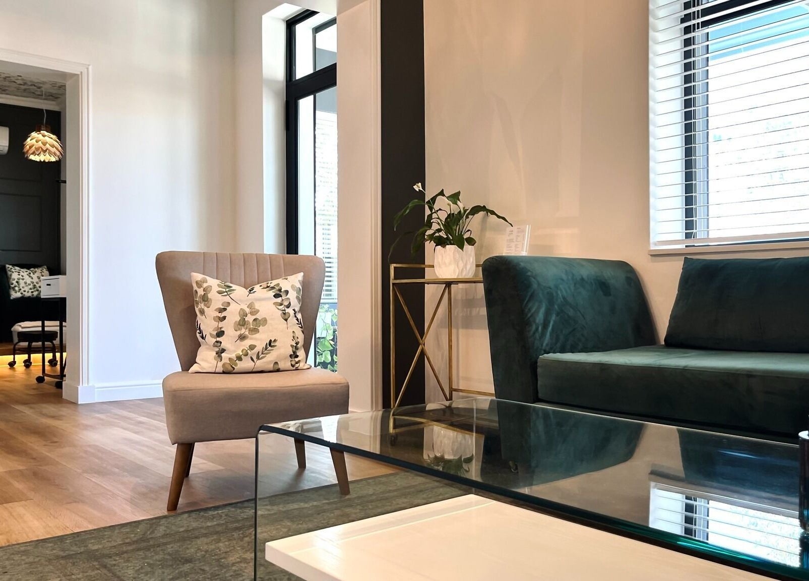 Cozy lounge area at The Skin Firm, Cape Town, Western Cape, ZA with elegant decor and soft lighting.