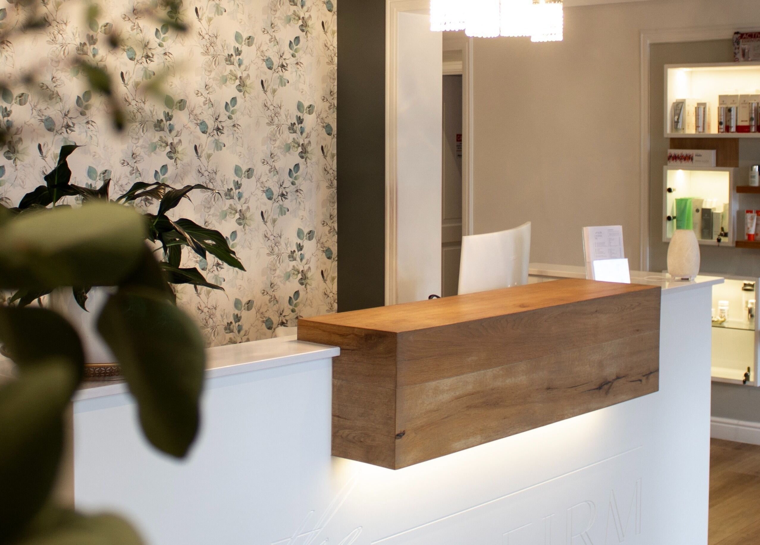 Reception area at The Skin Firm, Cape Town, Western Cape, ZA with elegant decor and modern design.