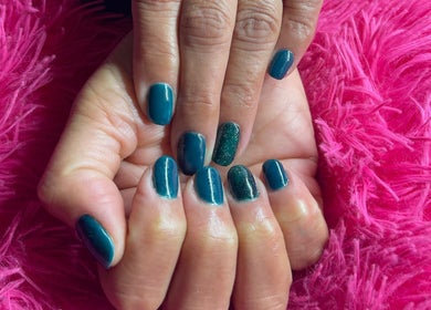 Stylish teal and glitter nails showcased at The Beauty Box, Cape Town, Western Cape, ZA.