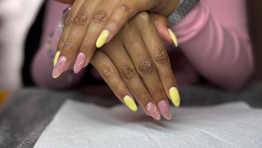 Vibrant pastel manicure at The Beauty Box, Cape Town, Western Cape, ZA. Nail art with pink and yellow tones.