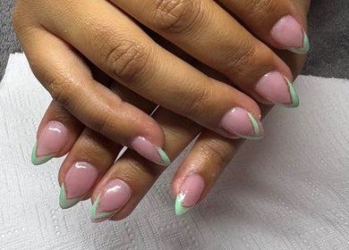 Elegant nail design at The Beauty Box, Cape Town, Western Cape, ZA, featuring pastel and gold accents.