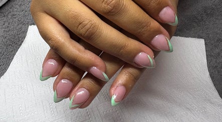 Elegant nail design at The Beauty Box, Cape Town, Western Cape, ZA, featuring pastel and gold accents.