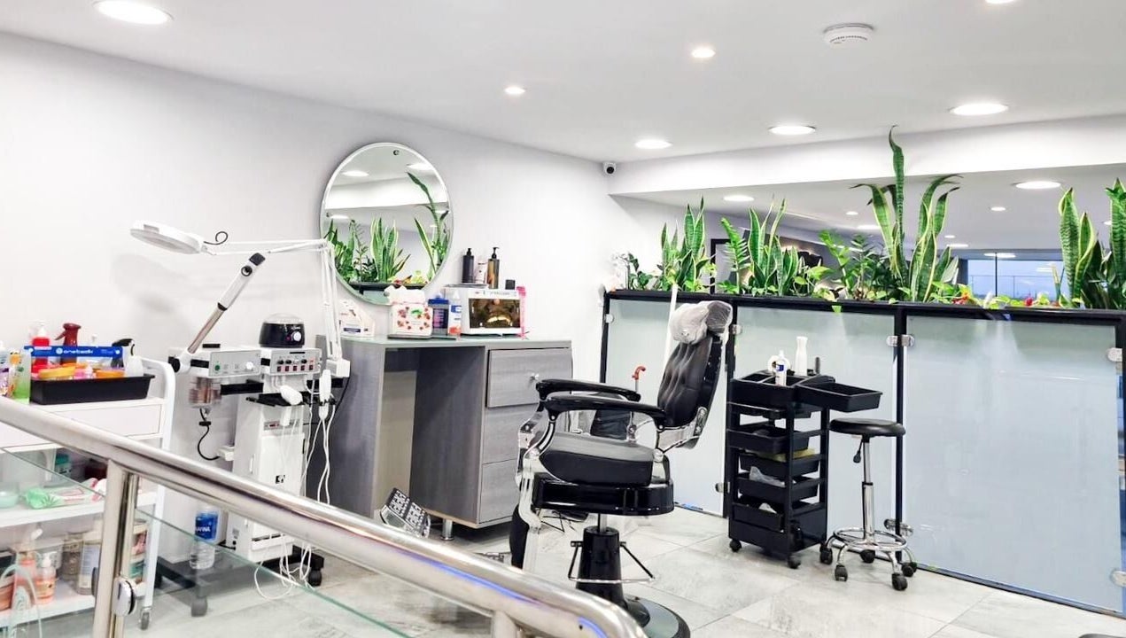 Clean, modern salon interior at Salon and Spa Elegant, Al Mubarraz, Eastern Province, SA with a well-equipped beauty chair.