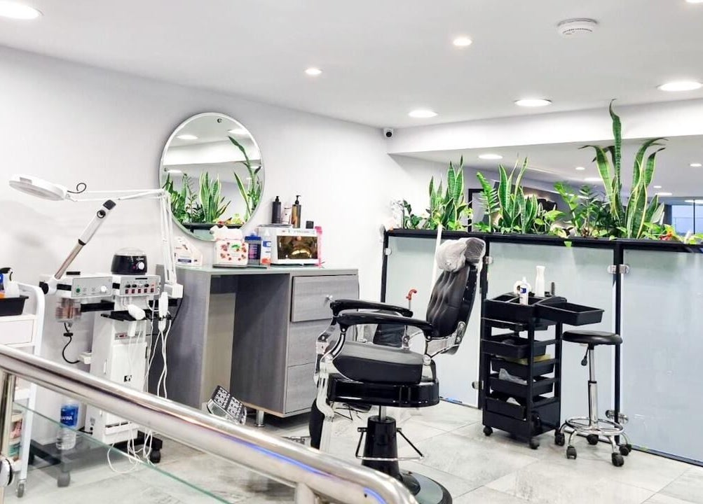 Clean, modern salon interior at Salon and Spa Elegant, Al Mubarraz, Eastern Province, SA with a well-equipped beauty chair.