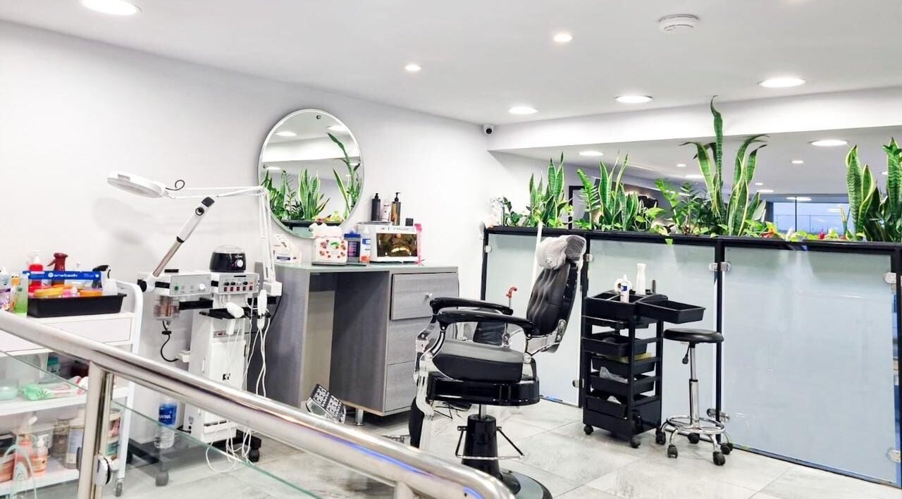 Clean, modern salon interior at Salon and Spa Elegant, Al Mubarraz, Eastern Province, SA with a well-equipped beauty chair.