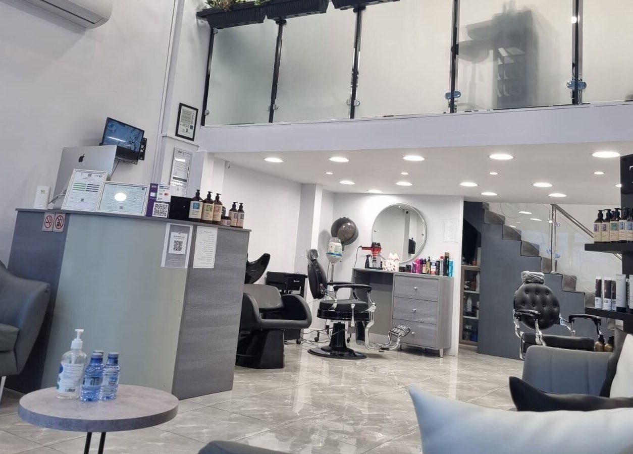Modern salon interior at Salon and Spa Elegant, Al Mubarraz, Eastern Province, SA with chic decor and seating.