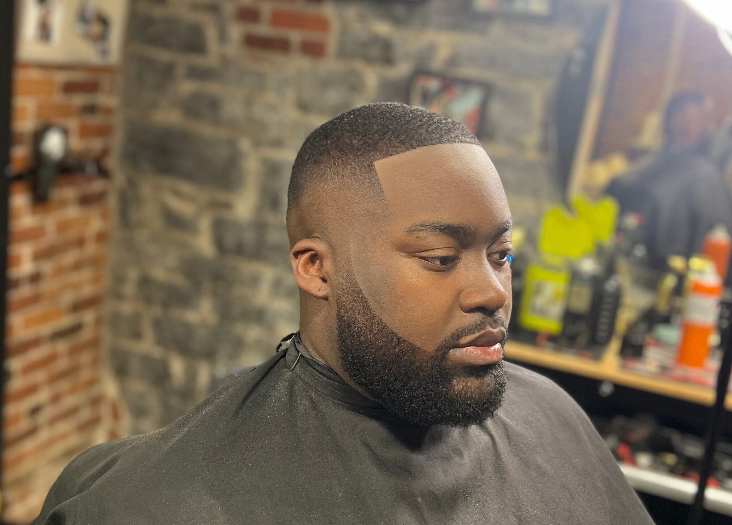 Client avec coupe dégradée chez BARBERSHOP Chez UKCUT, Québec, Québec, CA.
