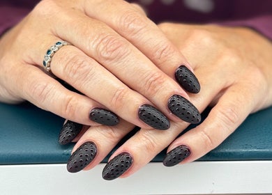 Elegant black nail art by Polished by Bec Mobile Nail Services in Grimsby, Ontario, CA showcases unique style.