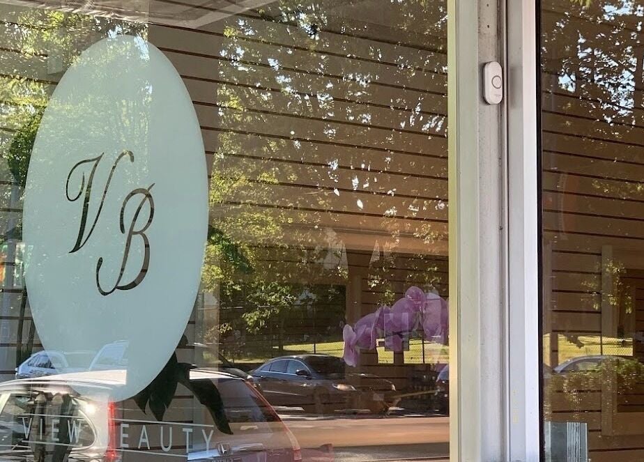 Entrance of View Beauty Salon and Spa in Vancouver, British Columbia, CA with logo on glass.