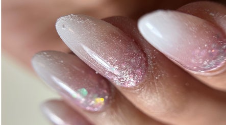 Close-up of glittery pink nail art at USA Nail and Beauty, Bishopbriggs, Scotland, GB.