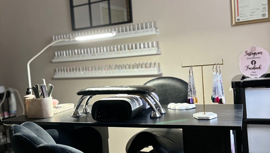 Manicure station at Eala Beauty, Northern Ireland, GB with nail polishes and tools beautifully arranged.
