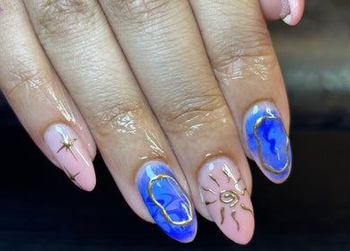 Elegant nail art with blue and gold accents at Eala Beauty, Northern Ireland, Northern Ireland, GB.