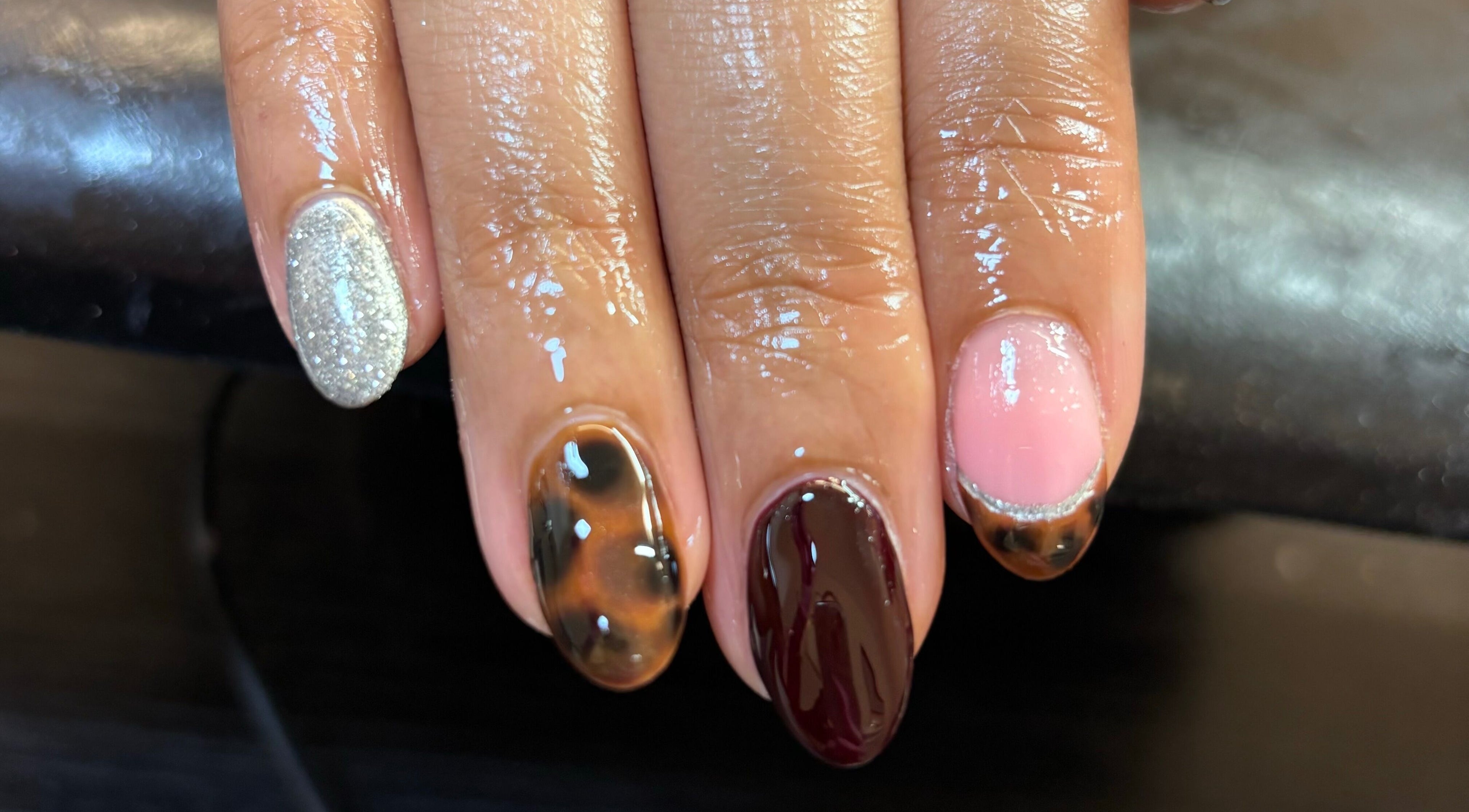 Stylish manicure showcasing diverse nail designs at Eala Beauty, Northern Ireland, Northern Ireland, GB.