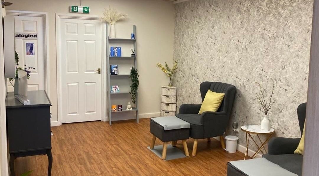 Calm waiting area at The Beauty Spot, Birmingham, England, GB, with cozy seating and modern decor.