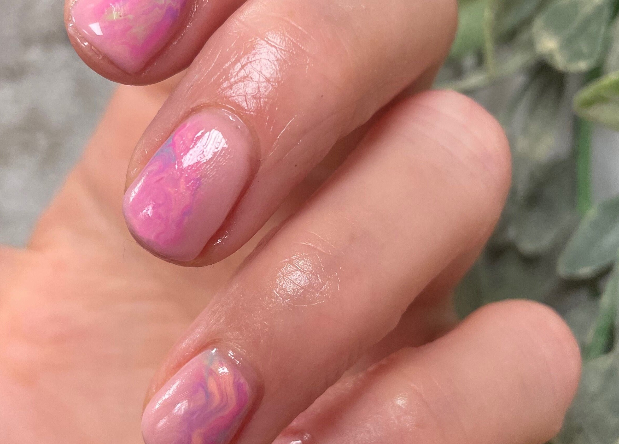 Elegant pink marble nails at The Beauty Spot, Birmingham, England, GB. Perfect for a chic look.