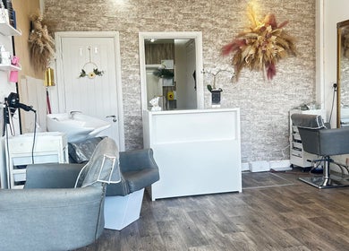 Arayah Beauty salon in Stockport, England, GB, featuring a stylish reception and modern hair styling station.