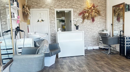 Arayah Beauty salon in Stockport, England, GB, featuring a stylish reception and modern hair styling station.