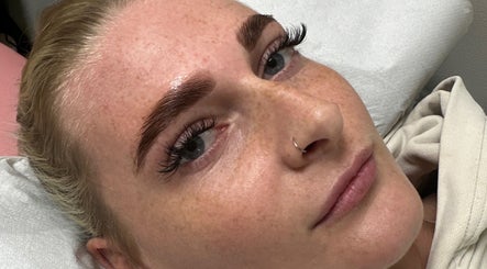 Close-up of a woman's enhanced lashes and brows at Ninety Nine Beauty, Wishaw, Scotland, GB.