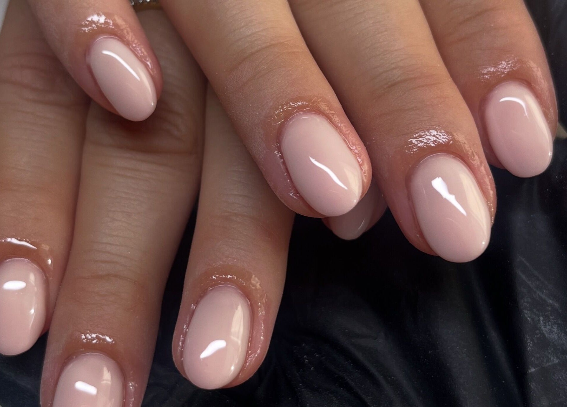 Glossy nude manicure at Claire’s Nails and Spray Tans in Colchester, GB.