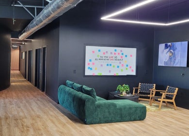 Welcoming lounge at Knotless at Flex Fitness Taupo, Taupō, Waikato Region, NZ, featuring vibrant seating.